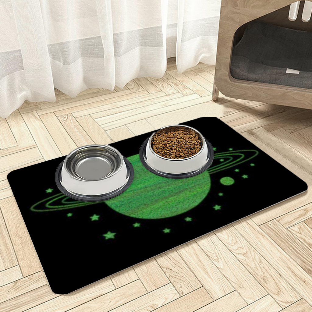 Green planets on a black background. Pet Feeding Mat