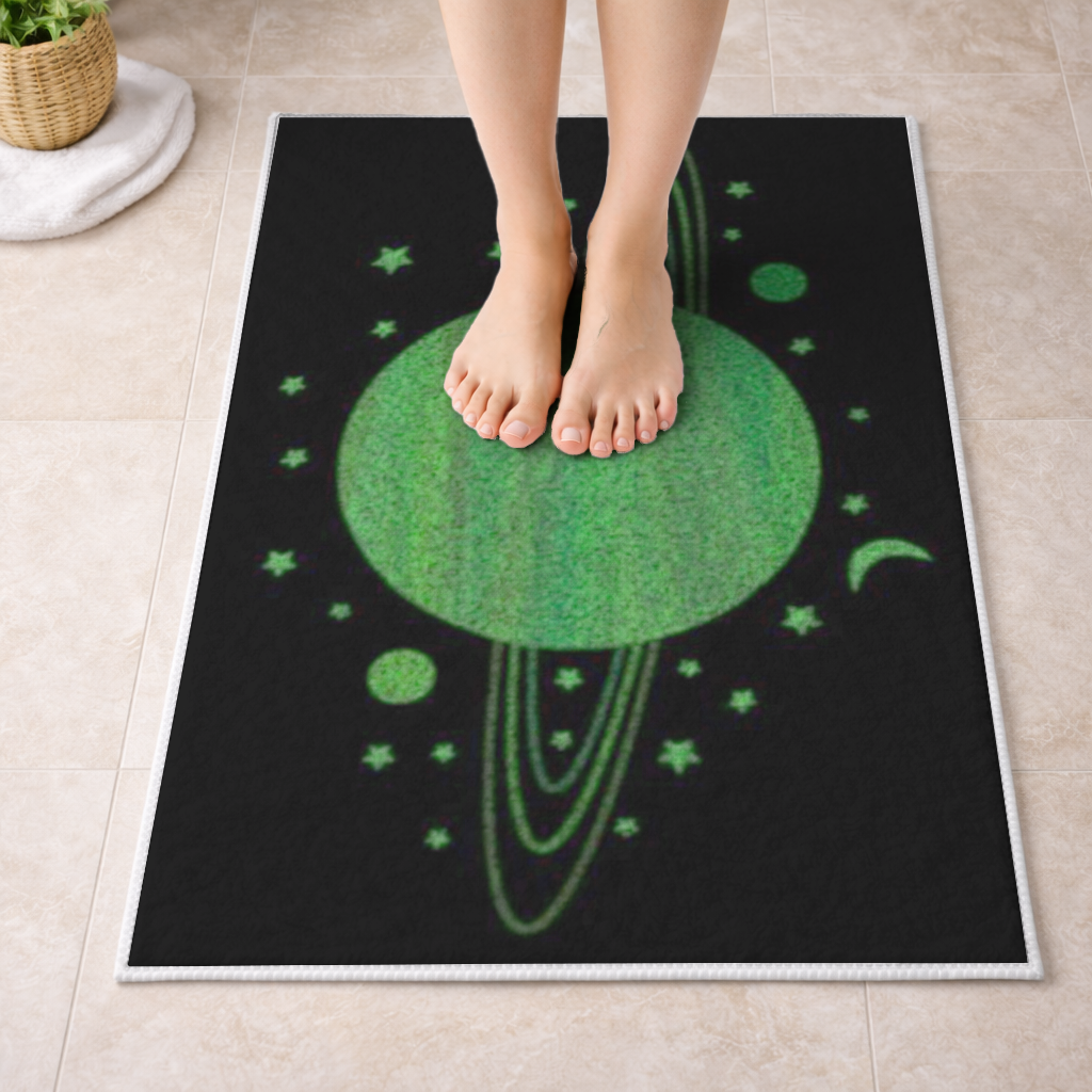 Green planets on a black background. Bath Mat
