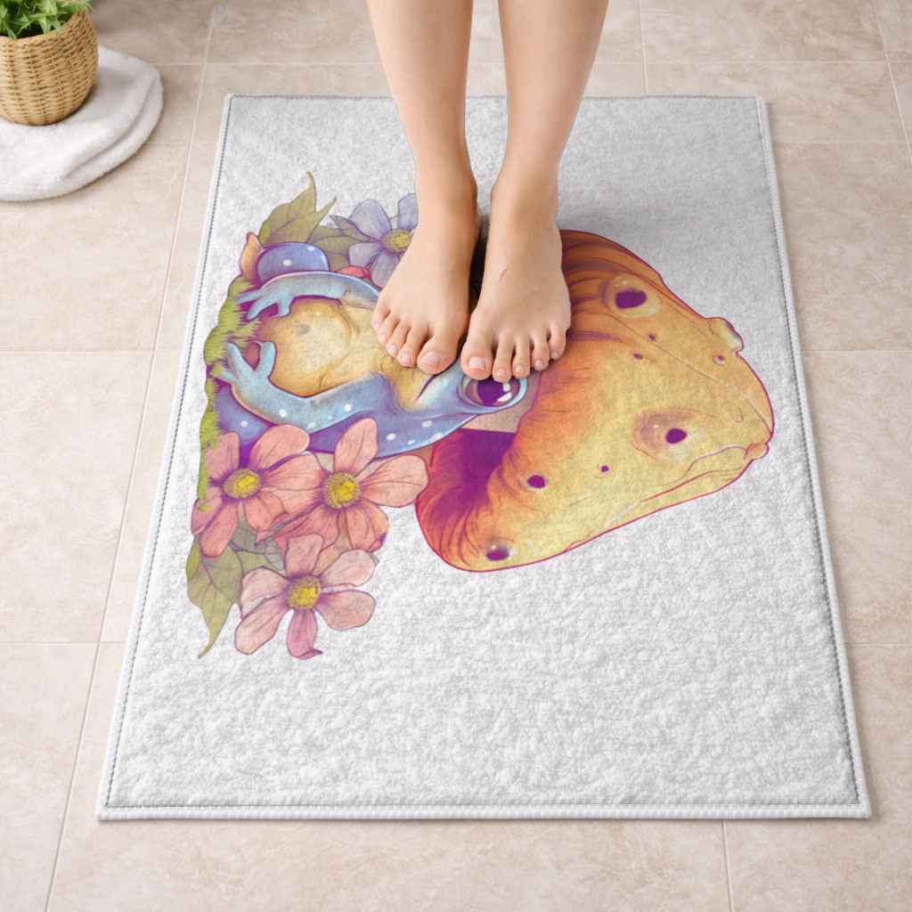 Blue Frog Resting Under Orange Mushroom Bath Mat