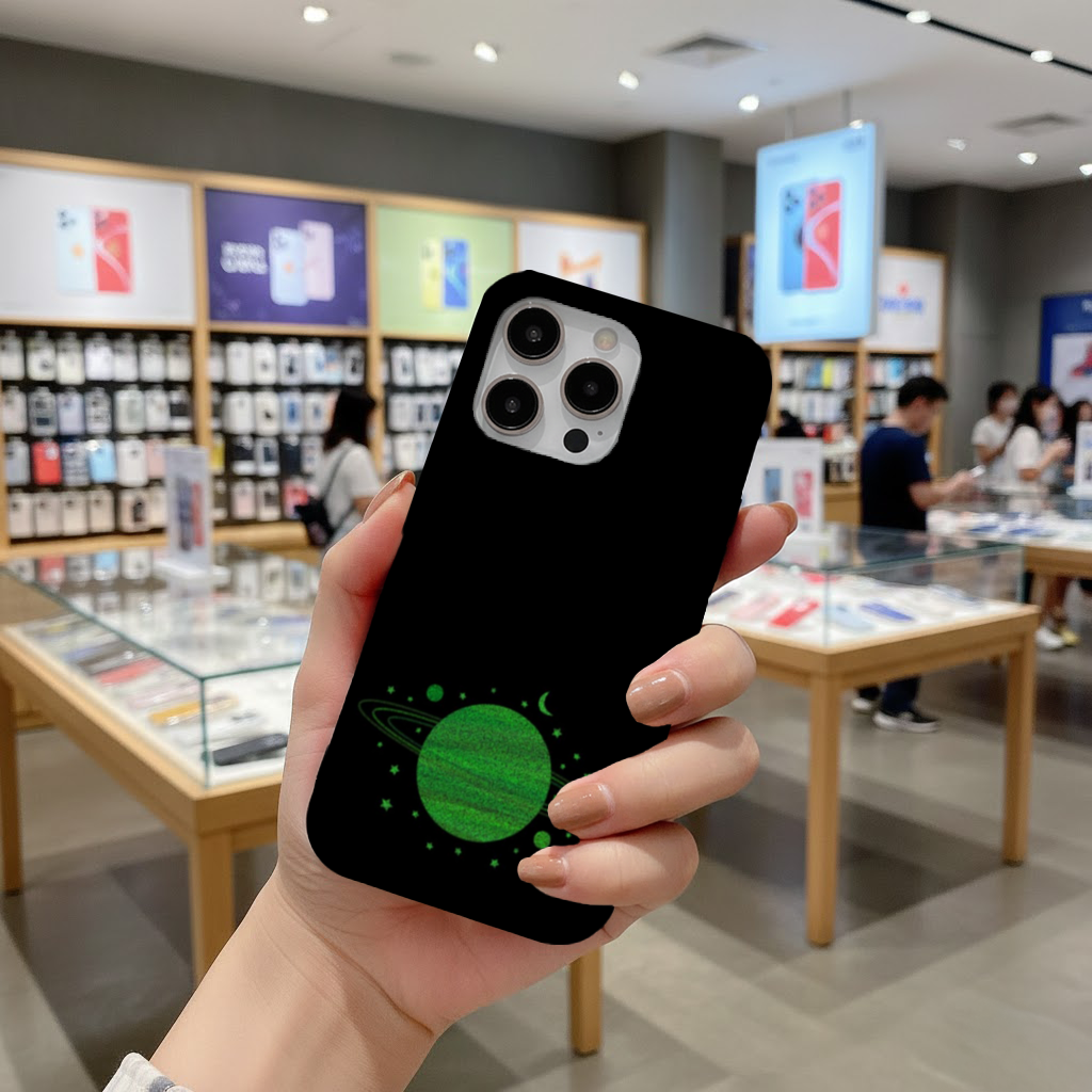 Green planets on a black background. iPhone 16 Pro and Pro Max Case