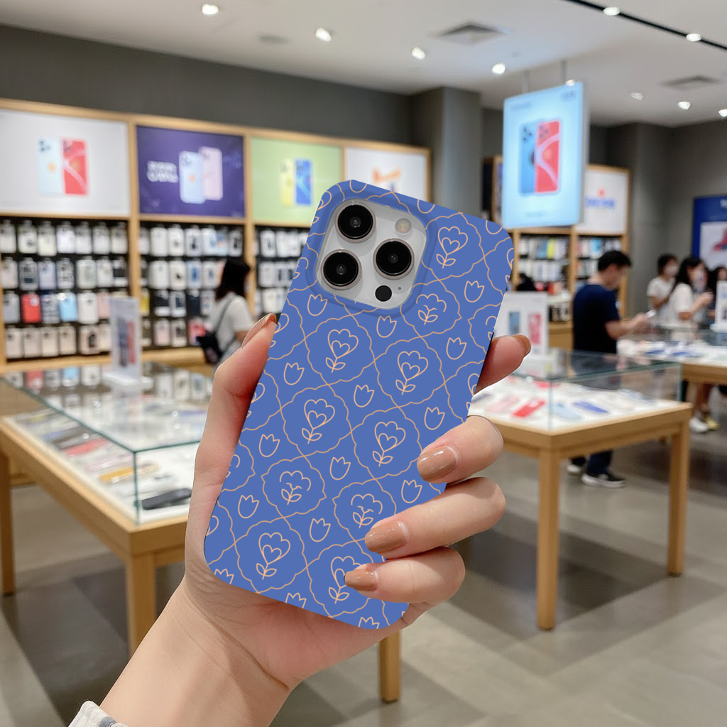 Orange Linear Floral Pattern on Blue iPhone 16 Pro and Pro Max Case